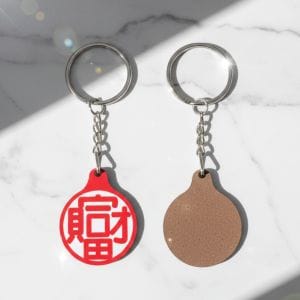 福宙「天圓地方」核心圖騰鑰匙圈，融合東方宇宙觀與隨身護身設計。